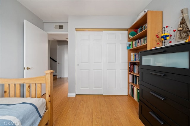 15796 Midwood Dr Unit 6, Granada Hills, CA 91344 - bedroom featuring light wood-type flooring and a closet