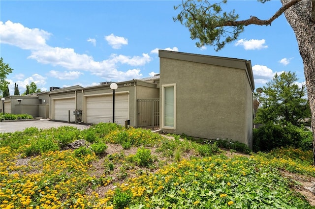 15796 Midwood Dr Unit 6, Granada Hills, CA 91344 - view of side of home featuring stucco siding