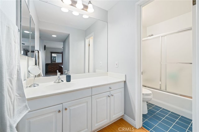 15796 Midwood Dr Unit 6, Granada Hills, CA 91344 - bathroom with toilet, vanity, combined bath / shower with glass door, and tile patterned floors
