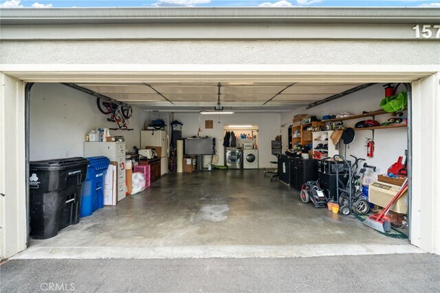 15796 Midwood Dr Unit 6, Granada Hills, CA 91344 - garage featuring washer and dryer
