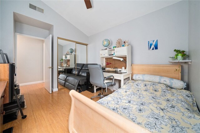 15796 Midwood Dr Unit 6, Granada Hills, CA 91344 - bedroom with light wood-style flooring, vaulted ceiling, a closet, ceiling fan, and a desk