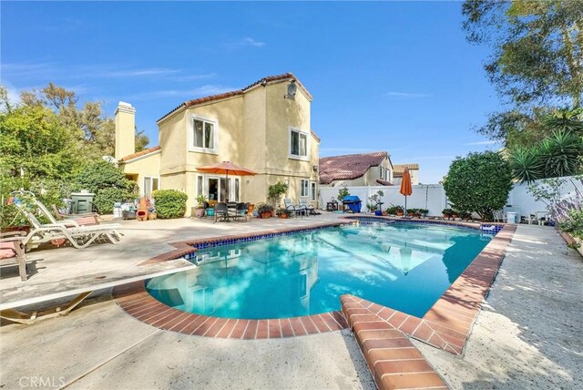 36 Westbrook Ln, Pomona, CA 91766 - view of pool featuring a patio, a fenced backyard, and a diving board