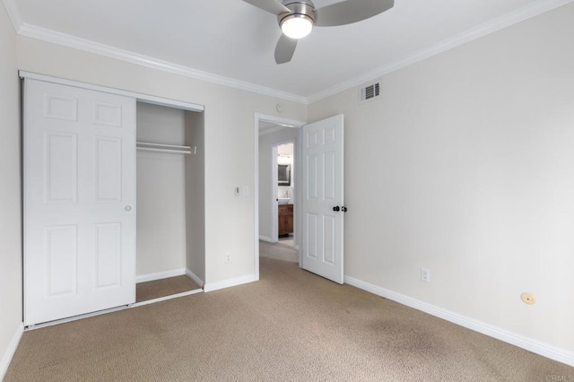 827 Del Mar Downs Rd Unit E, Solana Beach, CA 92075 - unfurnished bedroom featuring carpet, crown molding, baseboards, a closet, and a ceiling fan