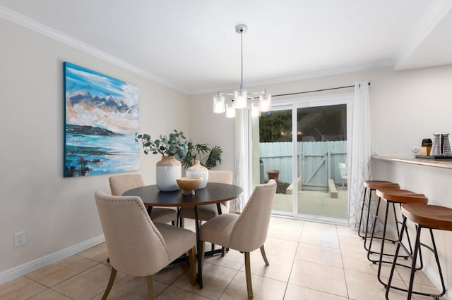 827 Del Mar Downs Rd Unit E, Solana Beach, CA 92075 - dining space featuring crown molding, light tile patterned floors, baseboards, and a chandelier
