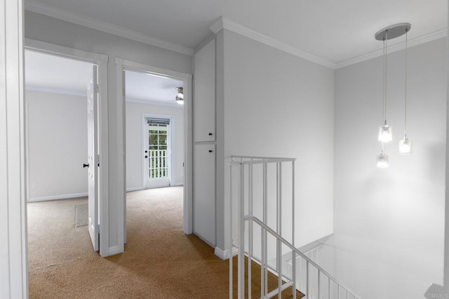 827 Del Mar Downs Rd Unit E, Solana Beach, CA 92075 - hallway with an upstairs landing, carpet flooring, ornamental molding, and baseboards