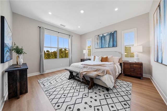 149 Fairgreen, Irvine, CA 92618 - bedroom featuring light wood finished floors, recessed lighting, and baseboards