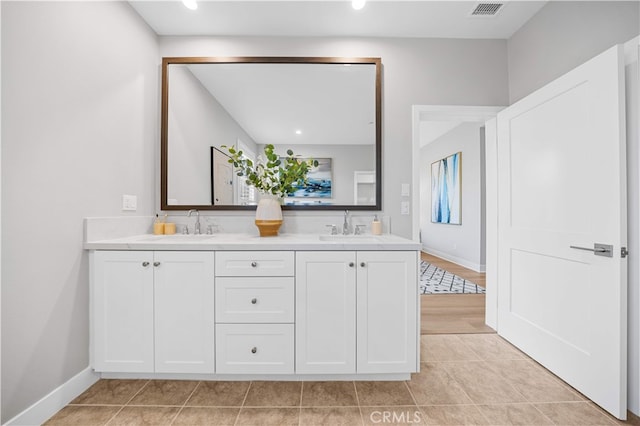 149 Fairgreen, Irvine, CA 92618 - bathroom featuring tile patterned flooring, double vanity, baseboards, and recessed lighting
