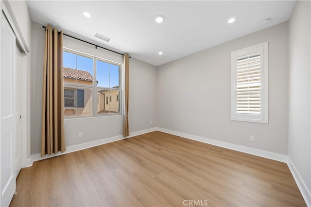 149 Fairgreen, Irvine, CA 92618 - empty room featuring light wood finished floors, baseboards, and recessed lighting