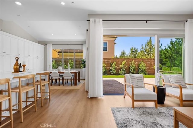 149 Fairgreen, Irvine, CA 92618 - dining space with light wood-type flooring, recessed lighting, and vaulted ceiling