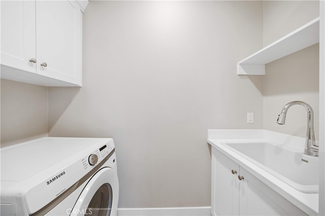 149 Fairgreen, Irvine, CA 92618 - clothes washing area featuring washer / dryer, cabinet space, and baseboards