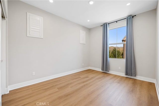 149 Fairgreen, Irvine, CA 92618 - spare room with recessed lighting, wood finished floors, and baseboards