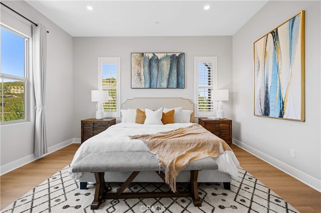 149 Fairgreen, Irvine, CA 92618 - bedroom with multiple windows, wood finished floors, recessed lighting, and baseboards