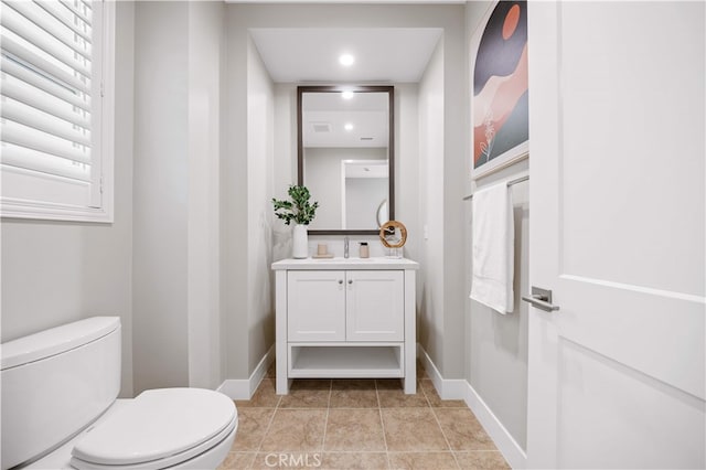 149 Fairgreen, Irvine, CA 92618 - bathroom featuring toilet, baseboards, vanity, and recessed lighting