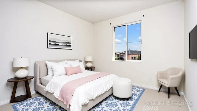 bedroom featuring baseboards
