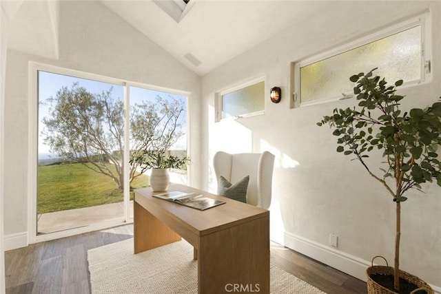home office with visible vents, baseboards, dark wood-style floors, and high vaulted ceiling