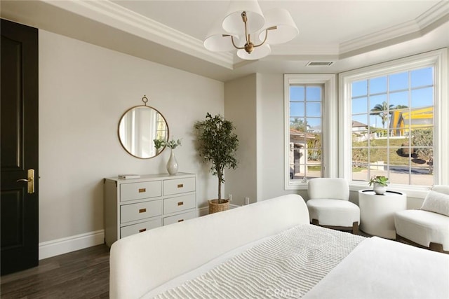 bedroom with ornamental molding, dark wood-style flooring, a notable chandelier, a raised ceiling, and baseboards