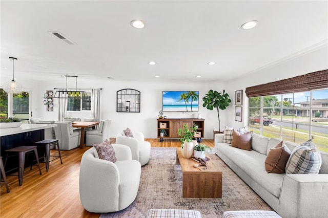 13402 Wheeler, North Tustin, CA 92705 - living room featuring plenty of natural light, visible vents, and light wood-style floors
