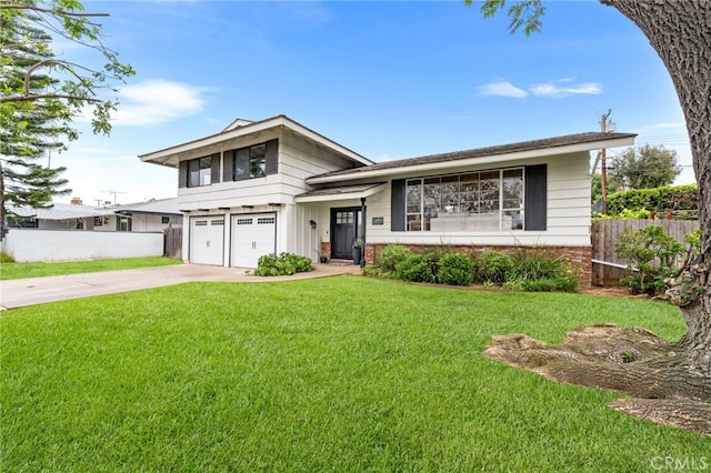 13402 Wheeler, North Tustin, CA 92705 - split level home featuring an attached garage, fence, concrete driveway, a front lawn, and brick siding