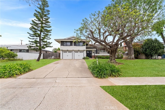 13402 Wheeler, North Tustin, CA 92705 - view of front of property featuring an attached garage, concrete driveway, fence, and a front lawn
