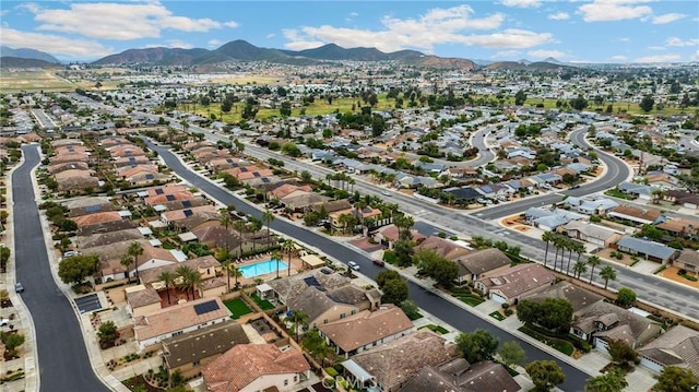 drone / aerial view with a mountain view and a residential view
