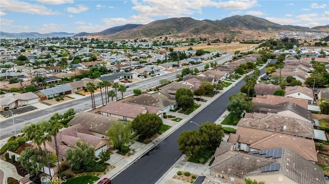 drone / aerial view featuring a mountain view and a residential view
