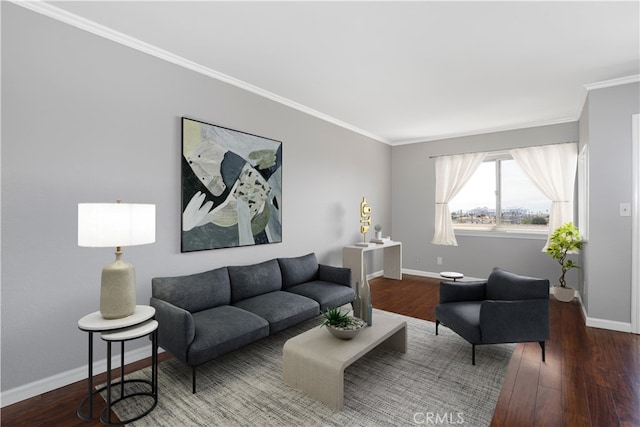living room with crown molding, wood finished floors, and baseboards