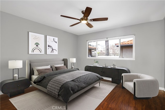 785 W 19th St Unit 10, San Pedro, CA 90731 - bedroom featuring wood finished floors, a ceiling fan, and baseboards