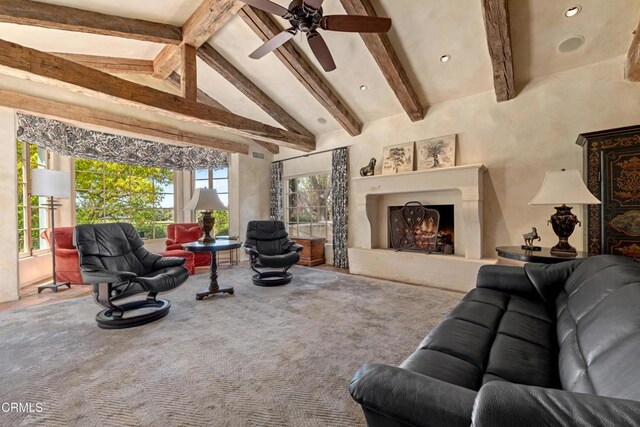 3325 Figueroa Mountain Rd, Los Olivos, CA 93441 - living area with a lit fireplace, ceiling fan, and carpet floors