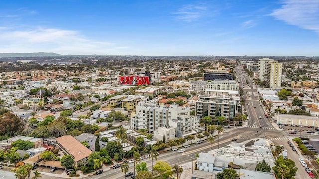 bird's eye view featuring a mountain view and a view of city