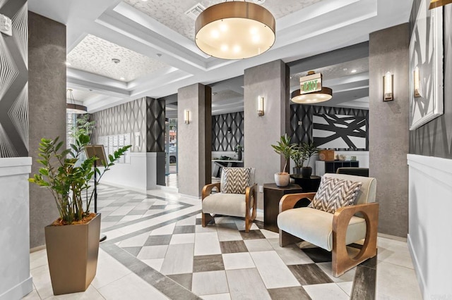 building lobby featuring visible vents