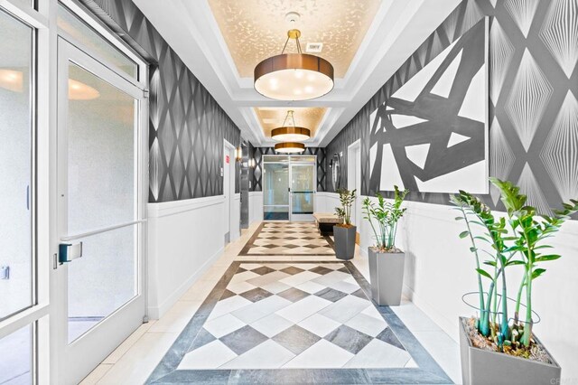 3740 Park Blvd Unit 209, San Diego, CA 92103 - hall featuring a raised ceiling and light tile patterned floors