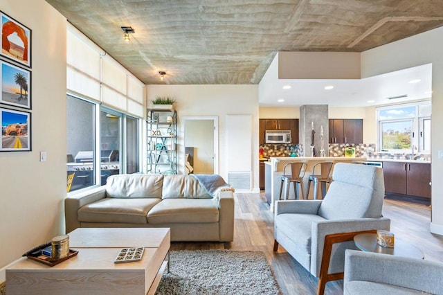 3740 Park Blvd Unit 209, San Diego, CA 92103 - living area featuring light wood-style floors and recessed lighting