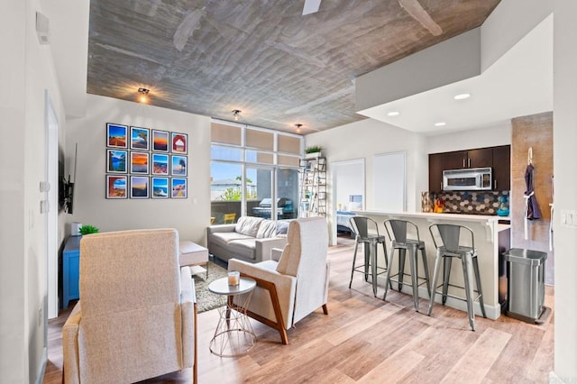 3740 Park Blvd Unit 209, San Diego, CA 92103 - living room featuring light wood-type flooring and recessed lighting