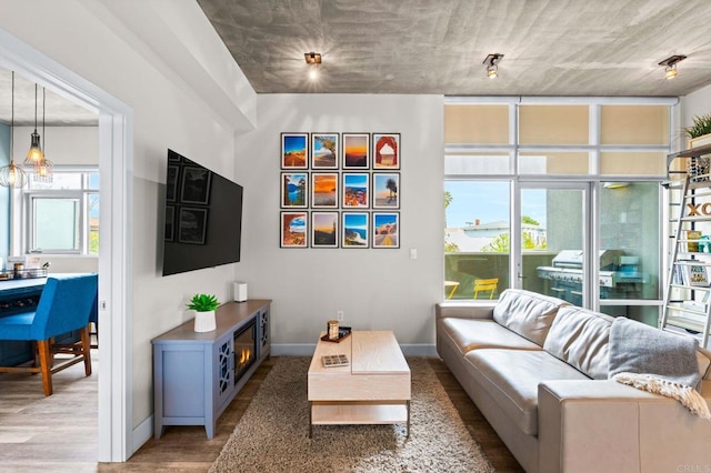 3740 Park Blvd Unit 209, San Diego, CA 92103 - living area featuring wood finished floors and baseboards