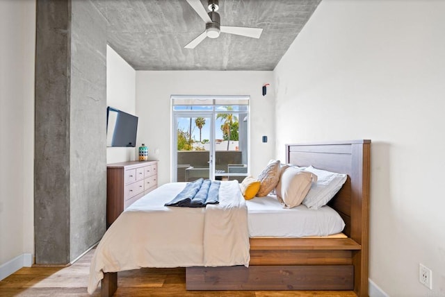 3740 Park Blvd Unit 209, San Diego, CA 92103 - bedroom with access to exterior, wood finished floors, a ceiling fan, and baseboards