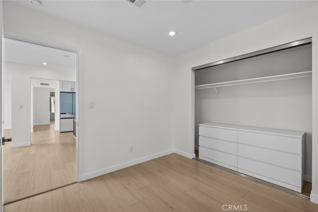 24431 La Glorita Cir, Newhall, CA 91321 - unfurnished bedroom featuring light wood-style flooring, baseboards, and recessed lighting
