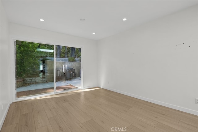 24431 La Glorita Cir, Newhall, CA 91321 - unfurnished room featuring baseboards and wood finished floors