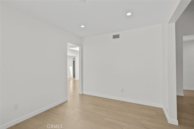 24431 La Glorita Cir, Newhall, CA 91321 - spare room featuring baseboards, recessed lighting, light wood-style floors, and visible vents