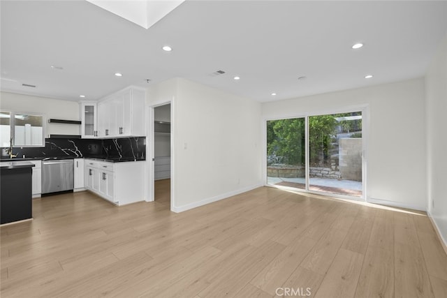24431 La Glorita Cir, Newhall, CA 91321 - kitchen featuring recessed lighting, stainless steel dishwasher, white cabinets, and backsplash