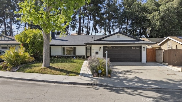 24431 La Glorita Cir, Newhall, CA 91321 - view of front of property featuring a gate, fence, a garage, and driveway