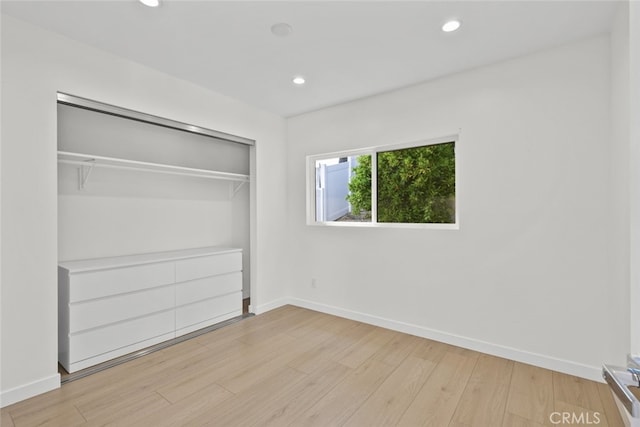 24431 La Glorita Cir, Newhall, CA 91321 - unfurnished bedroom featuring baseboards and light wood-style floors