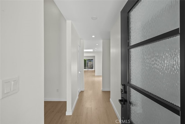 24431 La Glorita Cir, Newhall, CA 91321 - hall featuring wood finished floors, baseboards, and recessed lighting