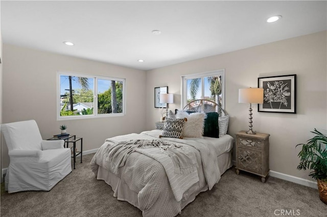 carpeted bedroom with baseboards and recessed lighting