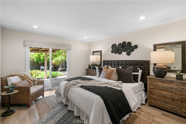 bedroom featuring recessed lighting, access to outside, and light wood-style floors