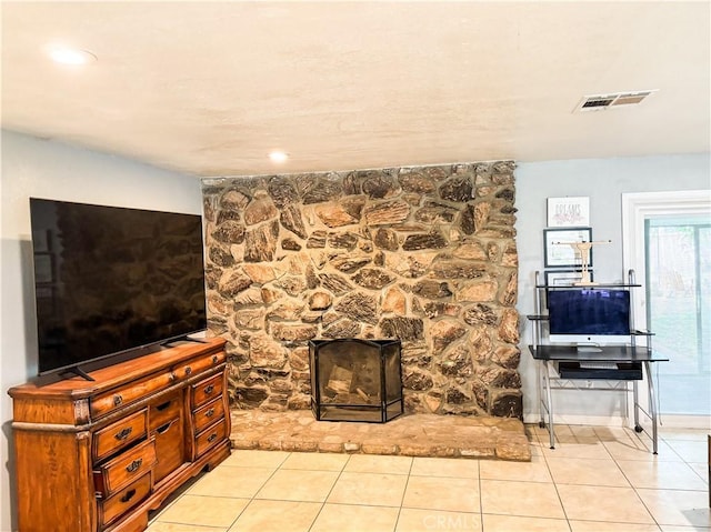 644 Whittendale St, Bakersfield, CA 93307 - unfurnished living room with visible vents and light tile patterned flooring