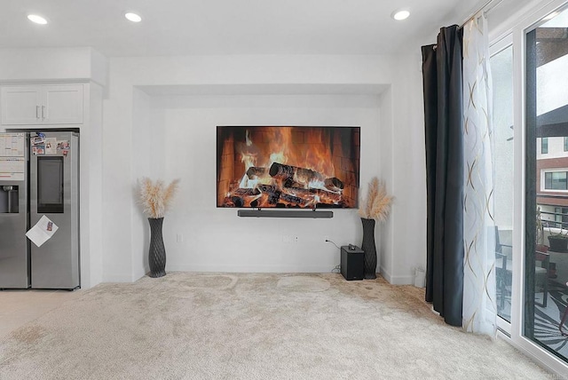 2152 Reed Dr, San Diego, CA 92154 - living room with light carpet, baseboards, and recessed lighting