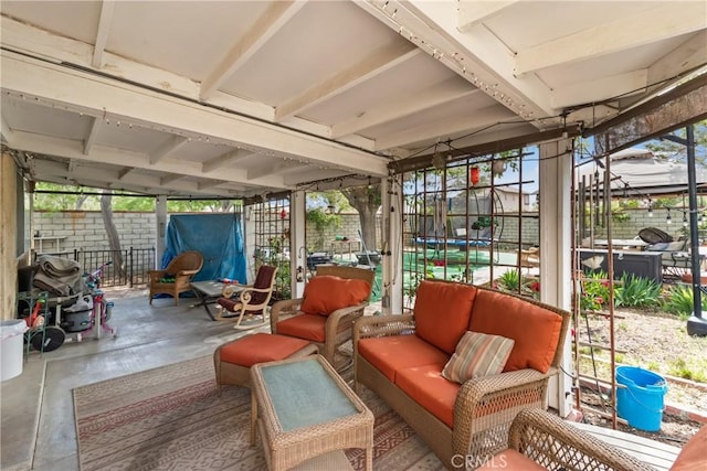 sunroom / solarium with an outdoor hangout area