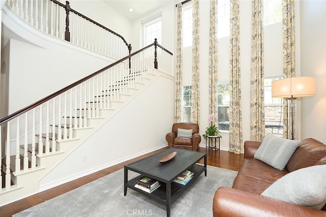 1472 Nicolas Way, Fullerton, CA 92833 - living room featuring a high ceiling, wood finished floors, baseboards, stairs, and recessed lighting