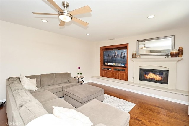 1472 Nicolas Way, Fullerton, CA 92833 - living room featuring recessed lighting, a ceiling fan, wood finished floors, a glass covered fireplace, and baseboards