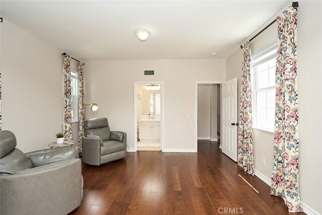 1472 Nicolas Way, Fullerton, CA 92833 - living area featuring dark wood-style floors and baseboards